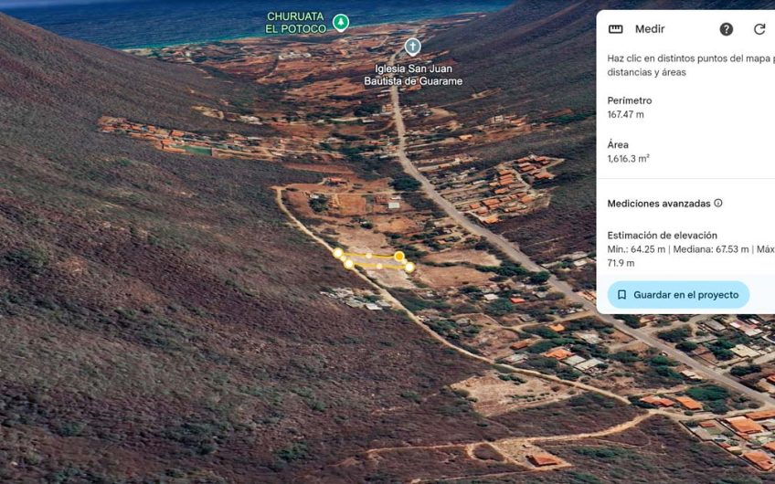 Se vende terreno con vista al mar y la montaña en Guarame con muro perimetral y tanque de agua